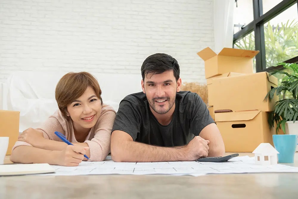 Happy Couple Packing Moving