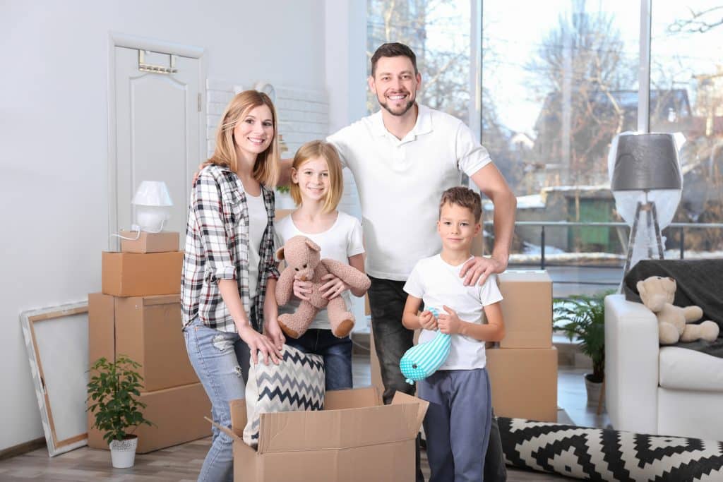 Young Family Packing Boxes